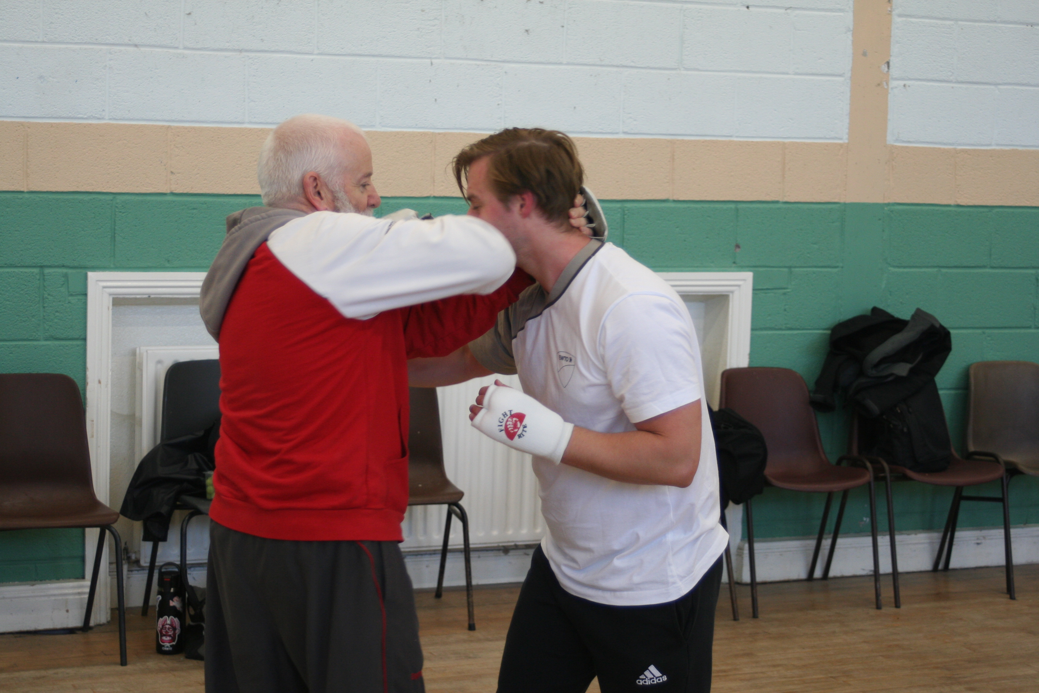 Sifu Canavan helps Bart with his elbows